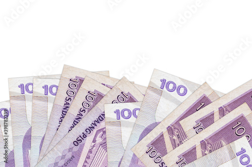 100 Philippine piso bills lies on bottom side of screen isolated on white background with copy space. Background banner template photo