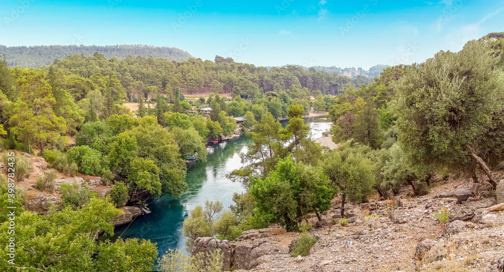 Obraz premium A view down the river in the Koprulu Canyon near Antalya in Turkey in the summertime