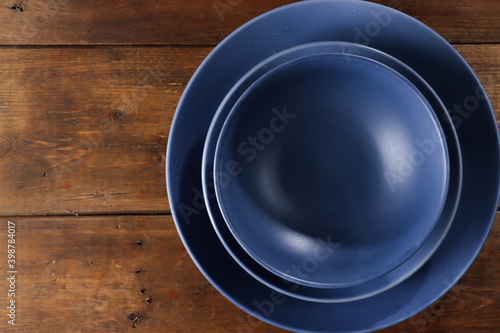 empty plate on wooden table