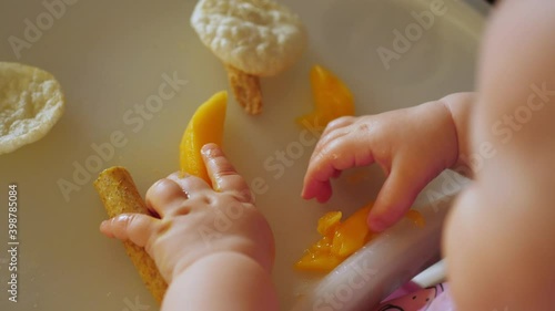 little baby infant eating baby-led led baby weaning blw food chair hands
