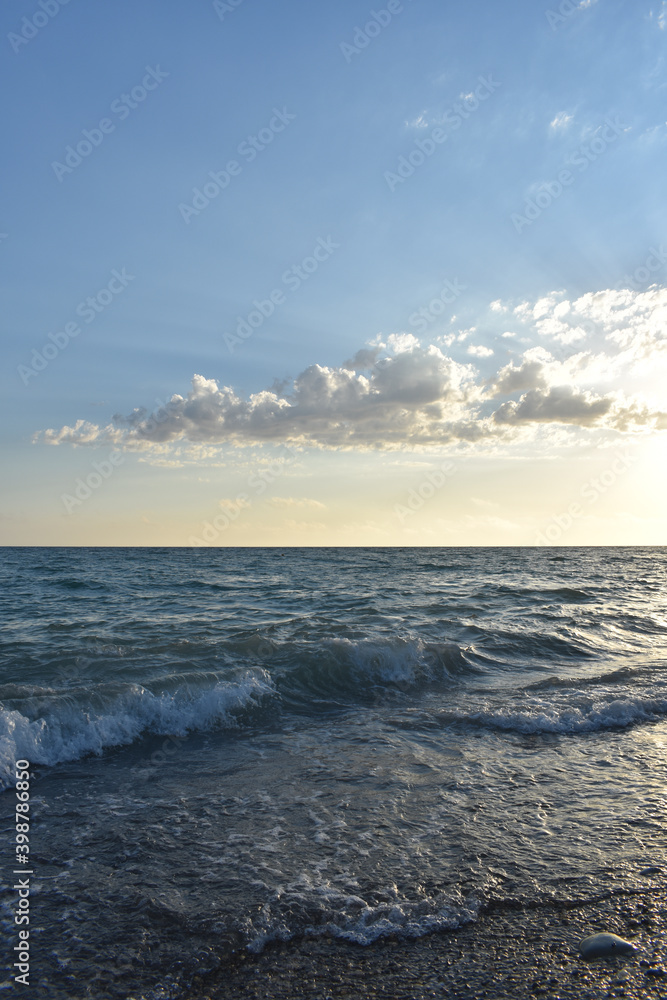 waves on the sea and yellow sky