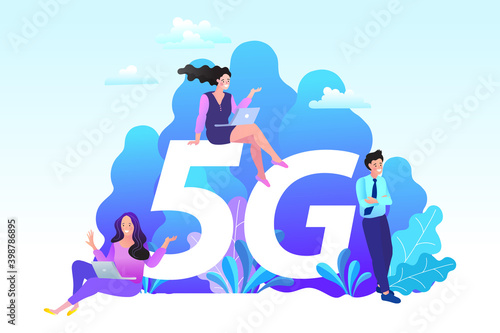 People collaborate in a modern business environment powered by a 5G network. Men and women use their computers for remote work, symbolizing a new generation of corporate communication.