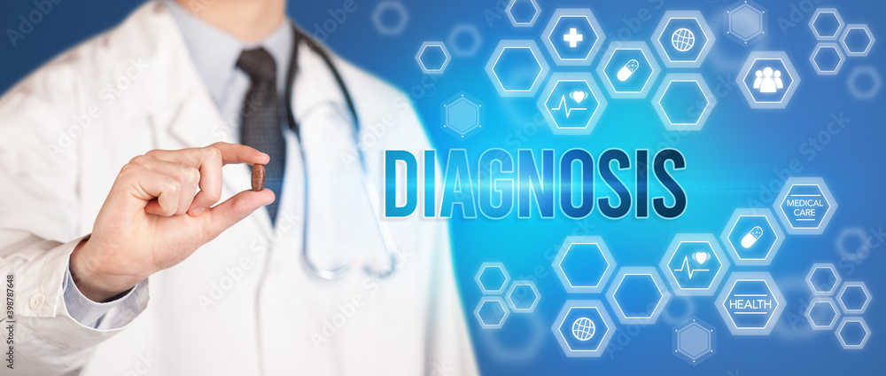 Close-up of a doctor giving you a pill with DIAGNOSIS inscription, medical concept Close-up of a doctor giving you a pill with DIAGNOSIS inscription, medical concept