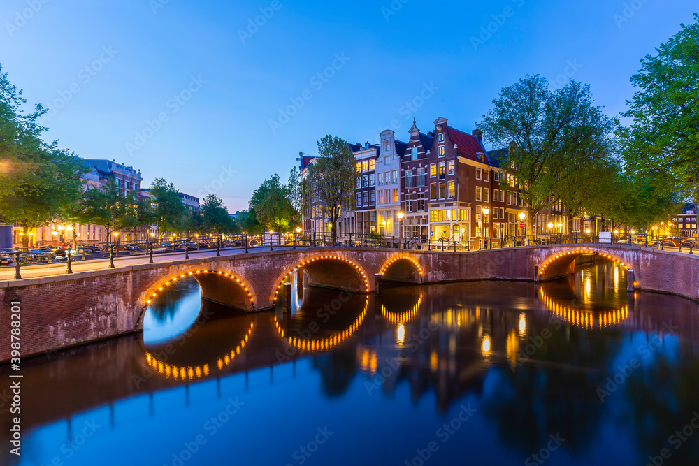 Amsterdam streets and canals during dusk