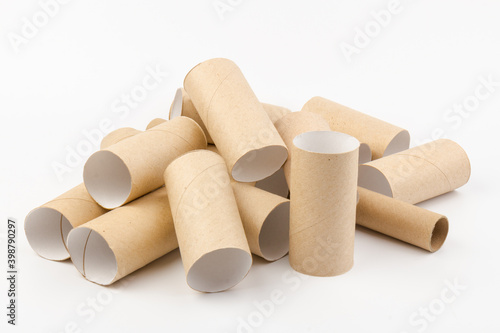 empty paper toilet rolls on white background