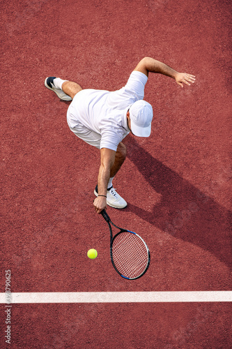 Tennis player hitting ball © ivanko80