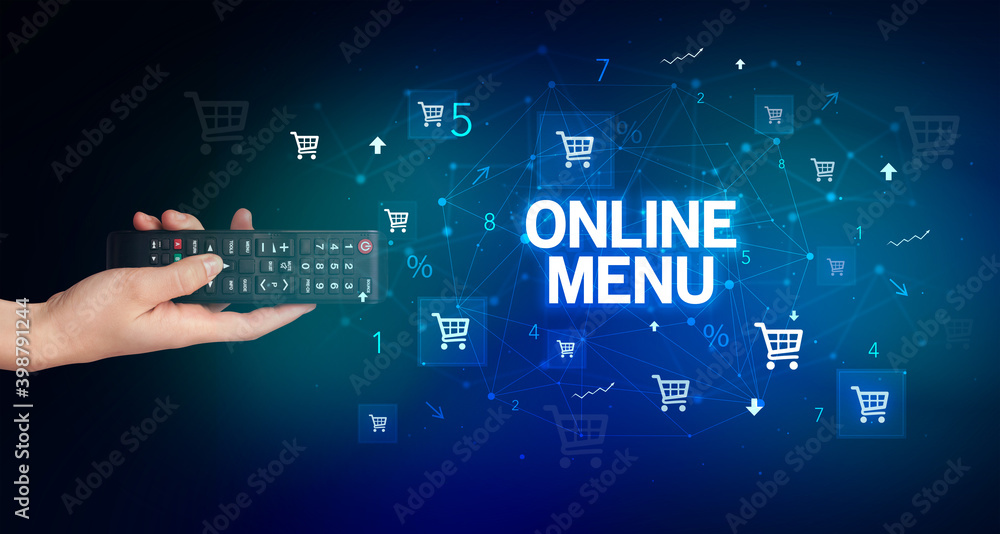hand holding wireless peripheral with ONLINE MENU inscription, online shopping concept hand holding wireless peripheral with ONLINE MENU inscription, online shopping concept