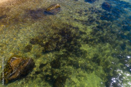 Shallow ocean waves over sandy ocean floor