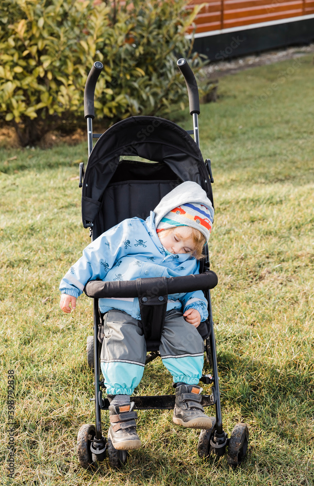 Toddler girl sleeping in stroller Toddler girl sleeping in stroller