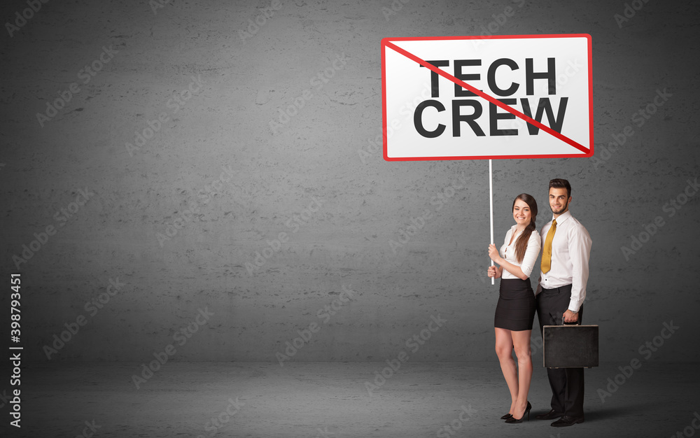 business person holding a traffic sign with TECH CREW inscription, new idea concept business person holding a traffic sign with TECH CREW inscription, new idea concept