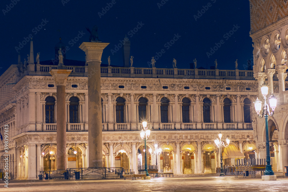 columns of Piazza San Marco at nigth without anyone because of the covid-19