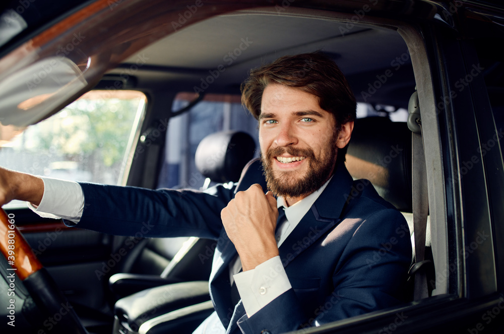 man in a suit driving a car trip road lifestyle passenger man in a suit driving a car trip road lifestyle passenger