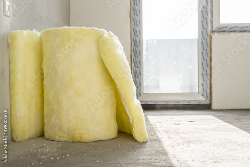 Fotografie Mineral wool cotton fiber insulation on the floor at the apartment in building d