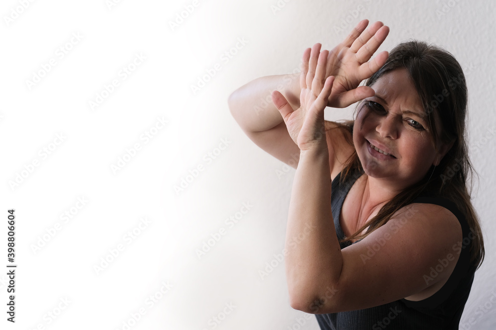 woman covered her face, crying, mascara flows black paint on her face, psychological stress concept, gaslighting, mobbing, domestic violence, in a work team woman covered her face, crying, mascara flows black paint on her face, psychological stress concept, gaslighting, mobbing, domestic violence, in a work team