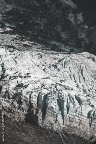 Les Bossons glacier and mountains in the Chamonix Valley in a cloudy day near montblanc, French Alps.