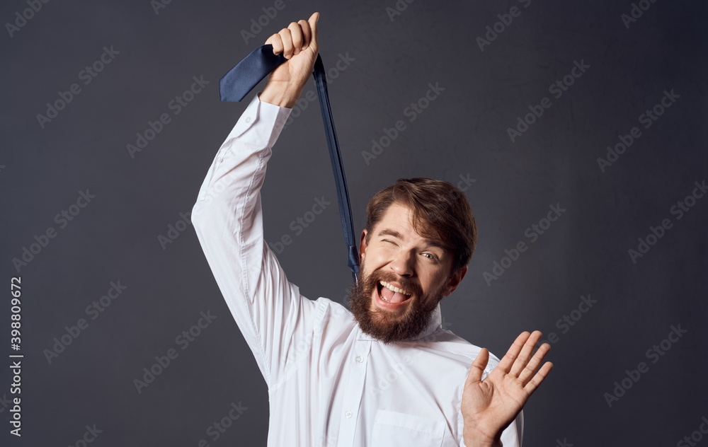 man holding tie in hand and choking suicide gray background model cropped view man holding tie in hand and choking suicide gray background model cropped view