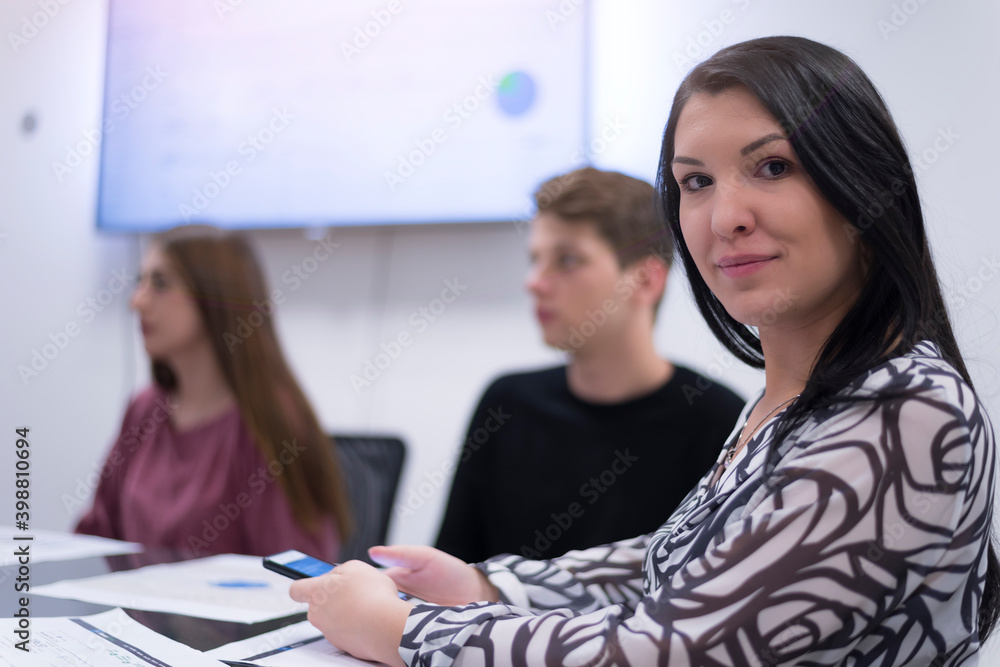 Young multiracial and multiethnic team of Business experts working together on important financial report. Economy and business concept Young multiracial and multiethnic team of Business experts working together on important financial report. Economy and business concept