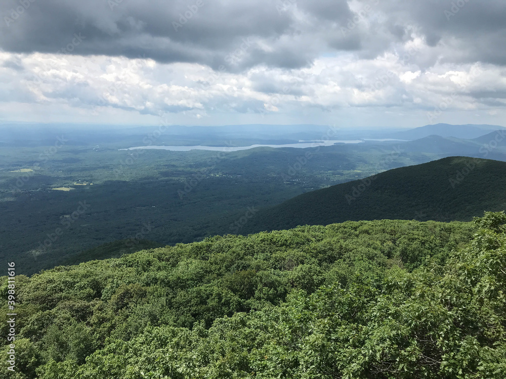 Fototapeta premium mountain landscape with trees and clouds