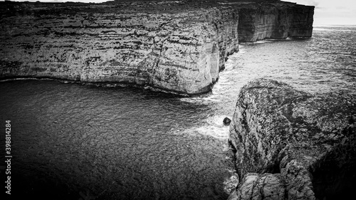 The remains of Azure Window at Dwerja Bay at the coast of Gozo Malta - aerial photography photo