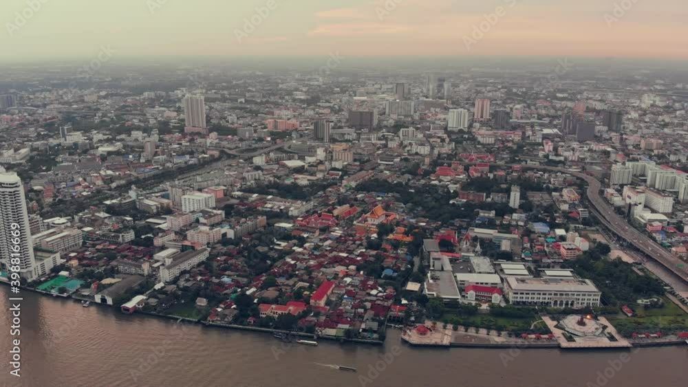 Purple dusk in Bangkok downtown near Chao Phraya river. Purple dusk in Bangkok downtown near Chao Phraya river.
