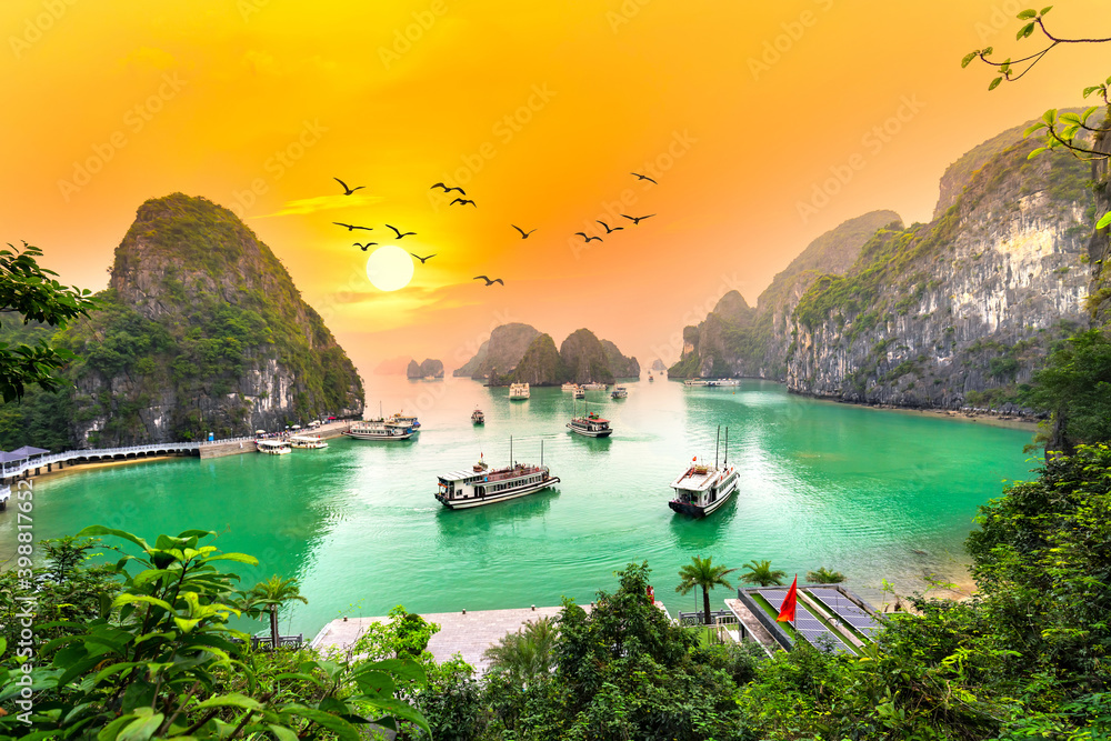 Dreamy sunset landscape Halong Bay, Vietnam view from adove. This is the UNESCO World Heritage Site, a beautiful natural wonder in northern Vietnam