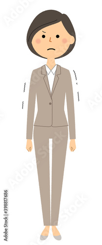 悔しがるスーツの女性