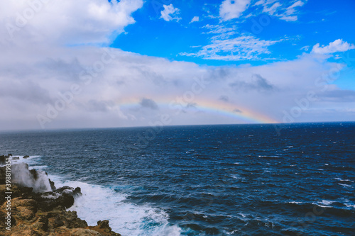 Rainbow by the sea, West coast of Maui island, Hawaii