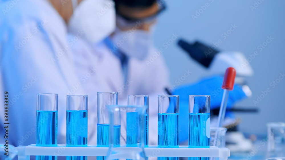Group of Asian scientists doing some research in the laboratory. Group of Asian scientists doing some research in the laboratory.