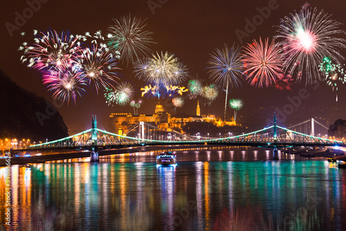 Photography Fireworks display at Buda Castle seen across Liberty bridge in Budapest