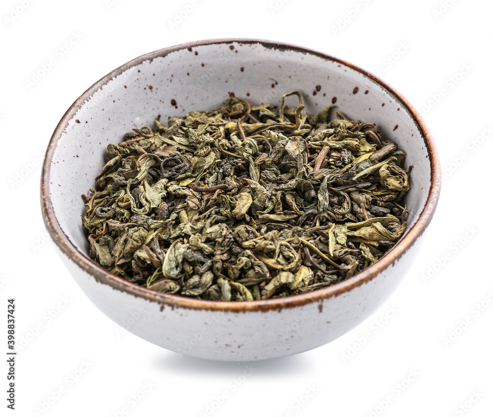 Bowl with dry tea on white background Bowl with dry tea on white background
