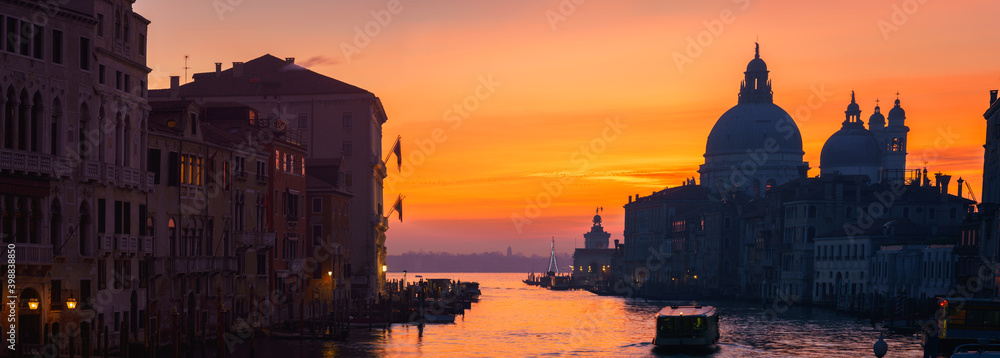 Beautiful sunrise silhouette of Grand Canal and Basilica Santa Maria della Salute in Venice, Italy