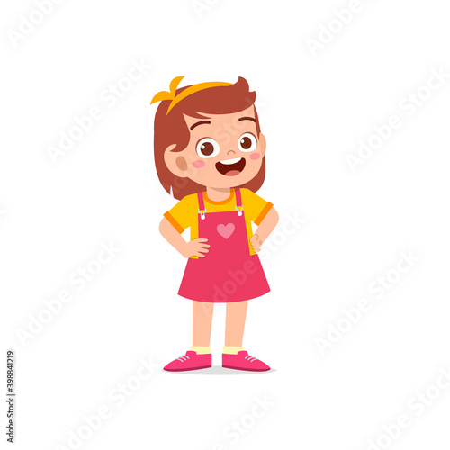 cute little kid girl stand smile with arm on hip pose expression