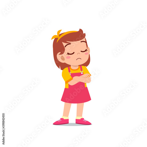 cute little kid girl dissatisfied with arm folded pose expression