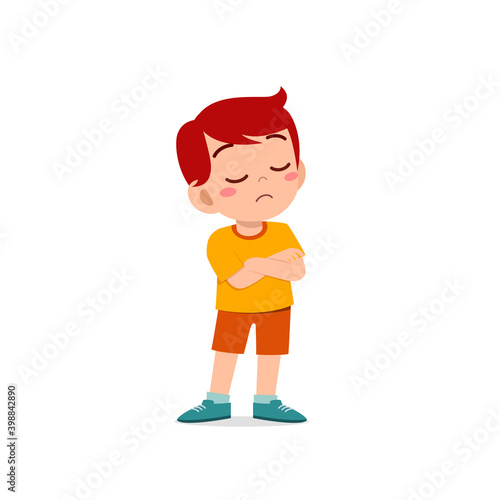 cute little kid boy dissatisfied with arm folded pose expression