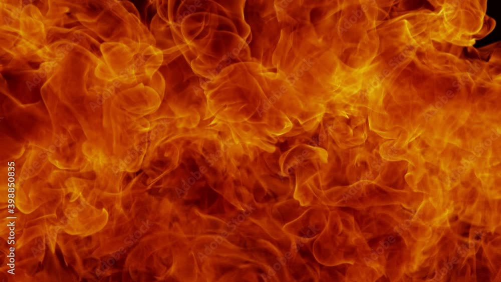 Super Slow Motion Detail Shot of Fire Explosion Against the Black Wall at 1000fps. Super Slow Motion Detail Shot of Fire Explosion Against the Black Wall at 1000fps.