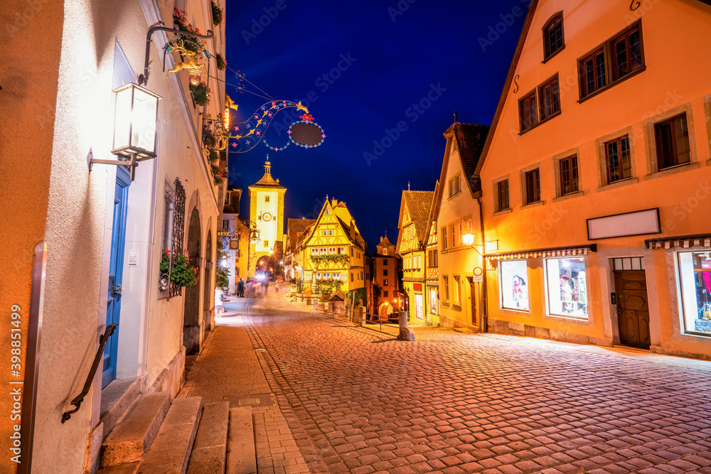Fototapeta premium Untere Schmiedgasse street at night. Rothenburg ob der Tauber. Germany