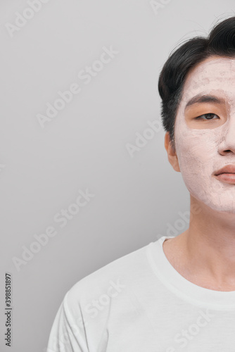 Cosmetology man portrait with mud healthy scrub