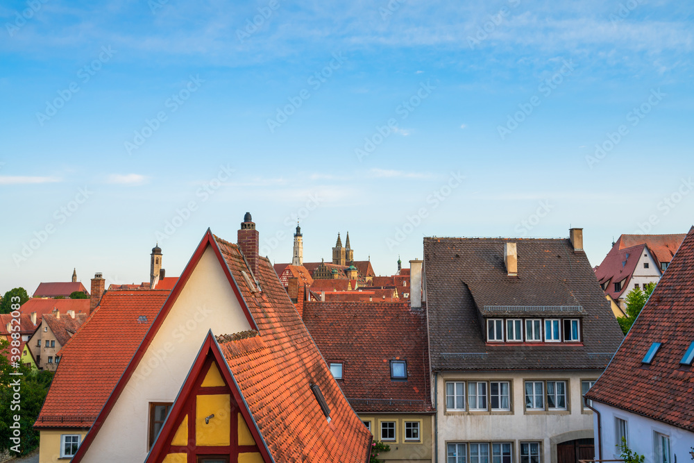 St. James Cathedral tower viewed across the rooftops. Rothenburg ob der Tauber. Germany