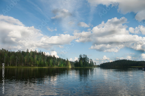 Pistajoki river blue sky clouds sunlight forest rafting North Karelia August 2014