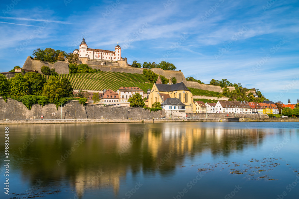 Marienberg Fortress reflecting in the river Main.colorful sunset. Wurzburg, Bavaria, Germany