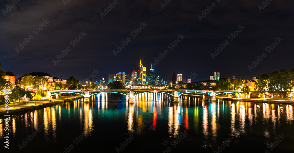 Frankfurt city skyline illuminated  at night. Germany