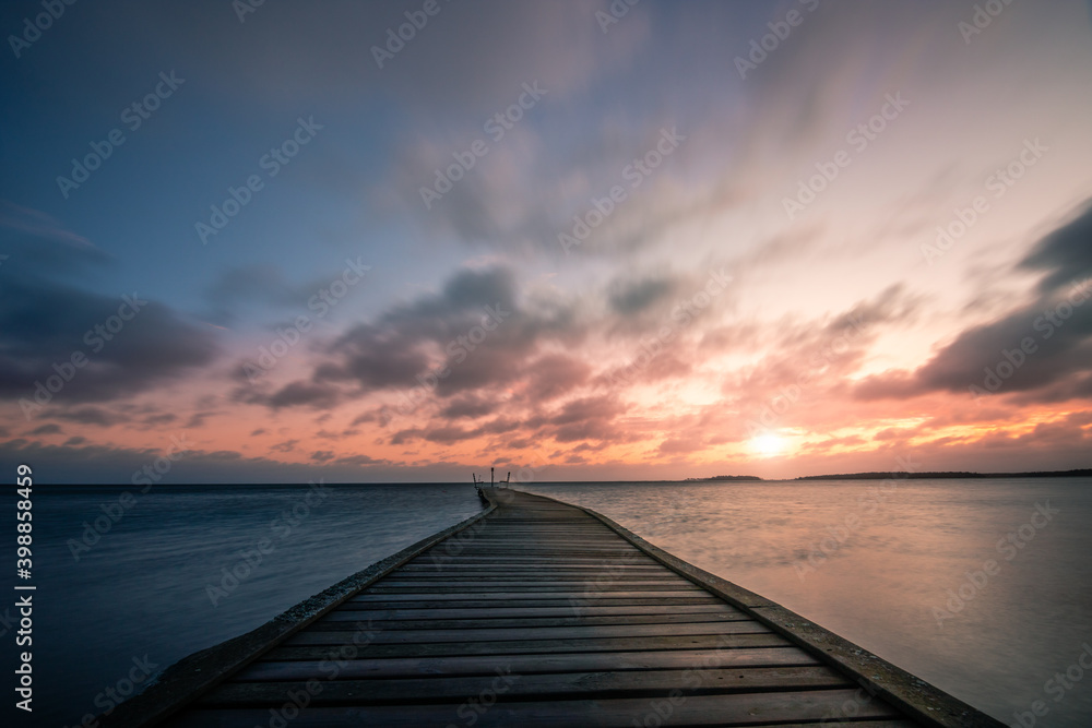 Lake in Sweden, great scenery in the morning at sunrise, Swedish culture and forests, by the lake and the sea. water long exposure

