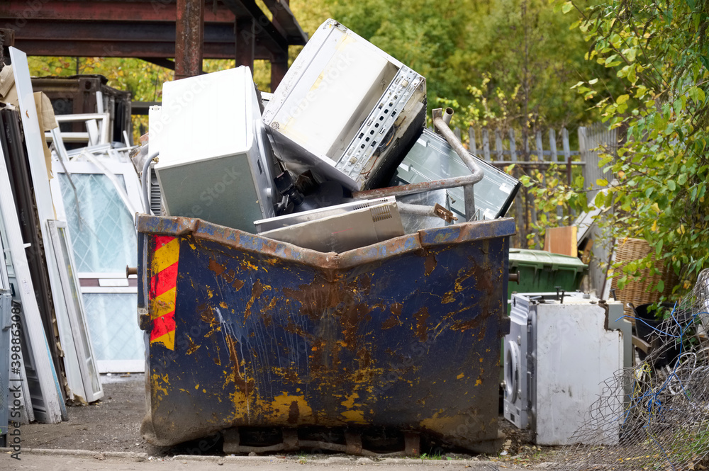 White goods in skip for disposal at dump site