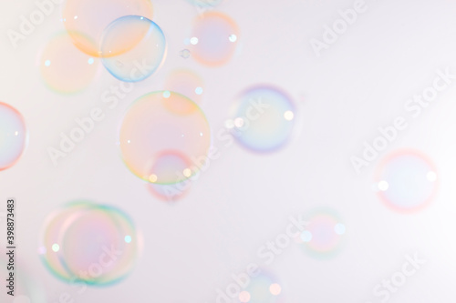 Beautiful colorful circle soap bubbles texture background. holiday fun summer background.