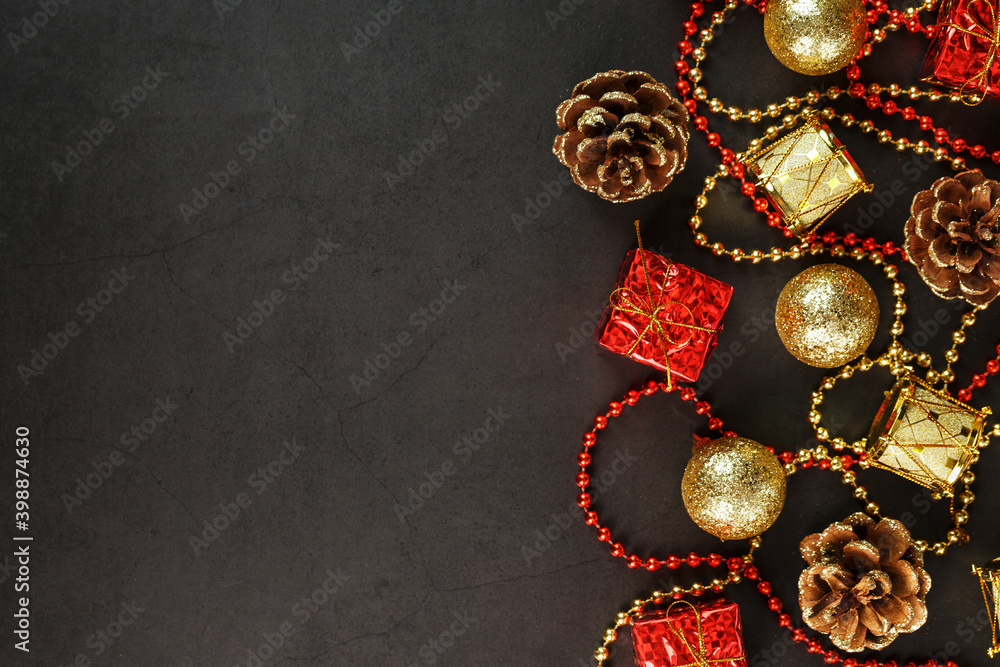Christmas or New Years dark background with red and gold decorations for the Christmas tree with free space. Christmas or New Years dark background with red and gold decorations for the Christmas tree with free space.