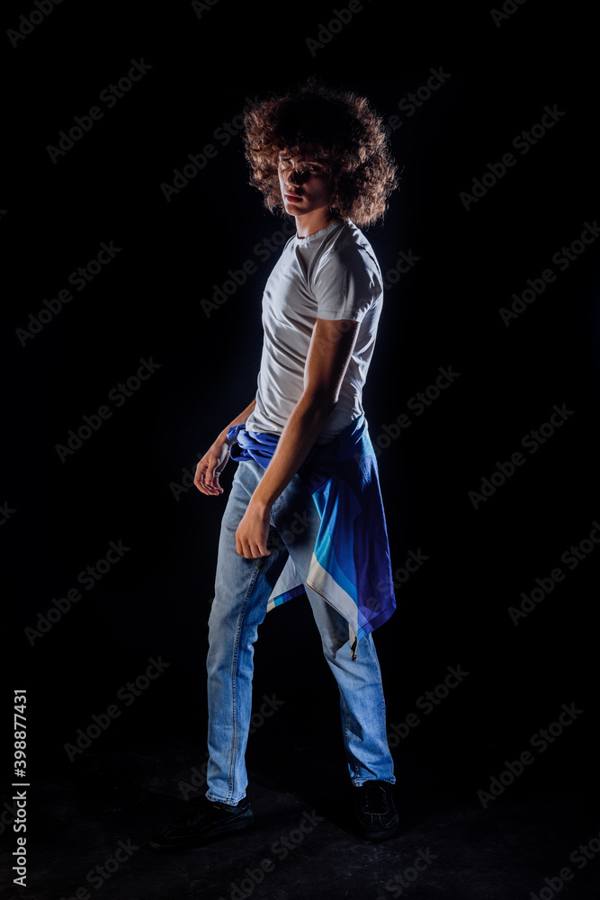 Fototapeta premium Punk man with curly hair