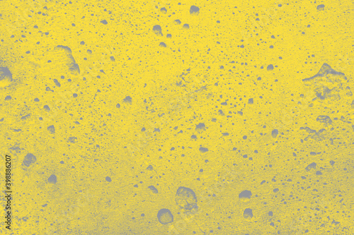 concrete wall in trendy 2021 new colors. Illuminating Yellow and Ultimate Gray. Color of the Year 2021. Loft style concept, textured background