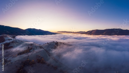 Grey mist covered the mountain hils