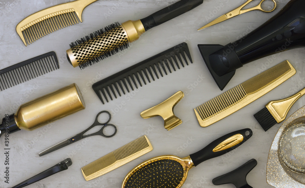 Background with gold and black hair salon accessories. Hairdressers tools,  Wallpaper in trendy gray and yellow colors. Stock Photo | Adobe Stock