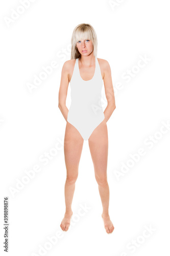 Full length portrait of a beautiful blonde woman wearing a white swimsuit  studio photo isolated in front of white background